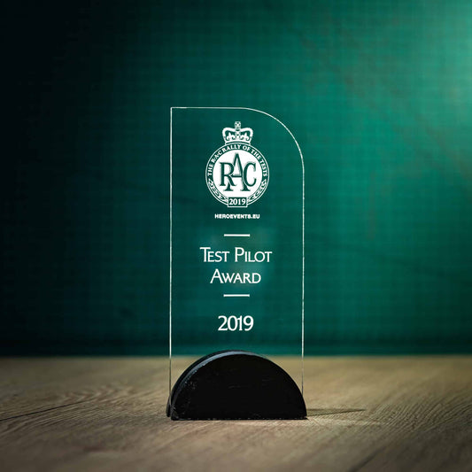 A Large personalised laser engraved Arch Perspex trophies with a Welsh Slate base