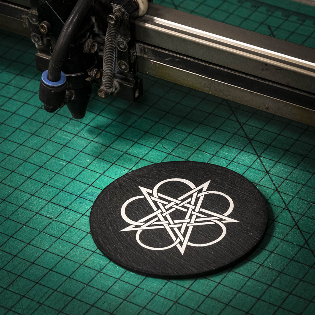 A laser engraved Welsh slate coaster with a Celtic Knot