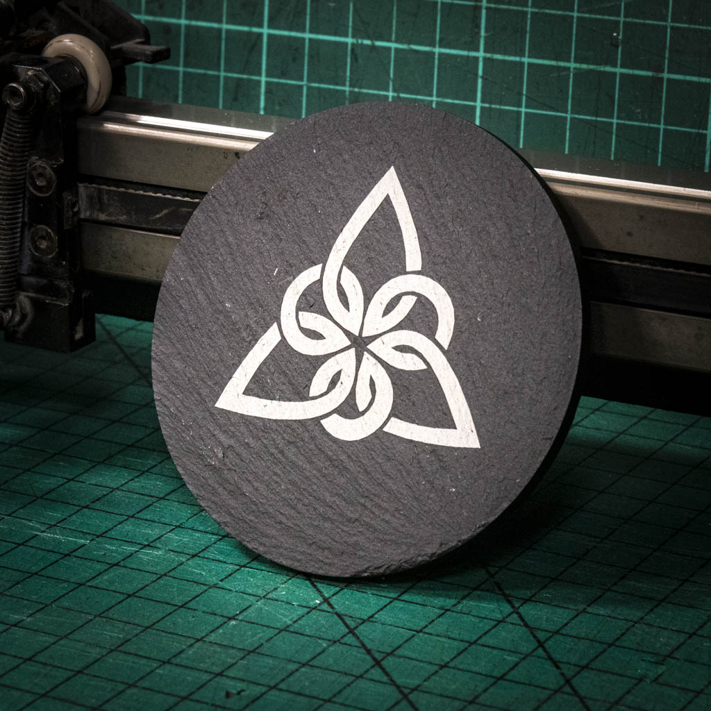 A laser engraved Welsh slate coaster with a Celtic Knot