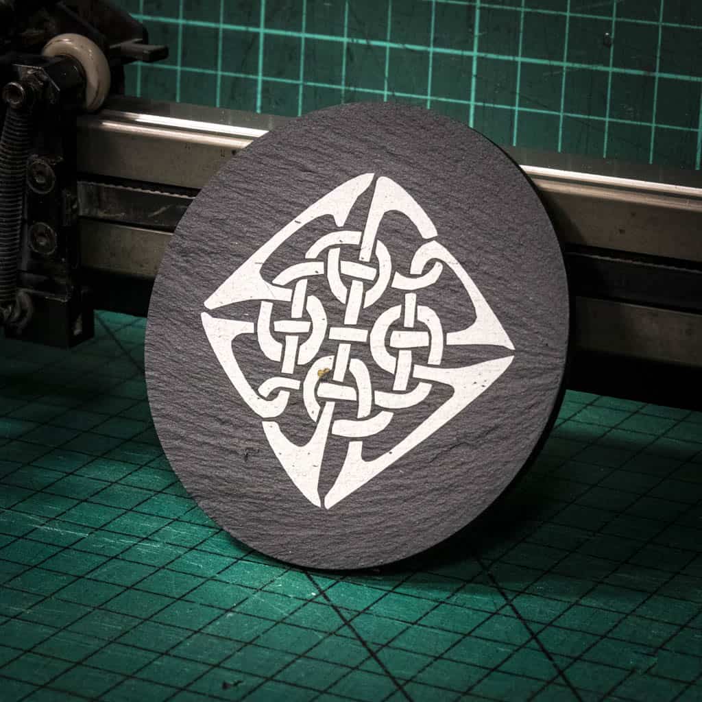 A laser engraved Welsh slate coaster with a Celtic Knot