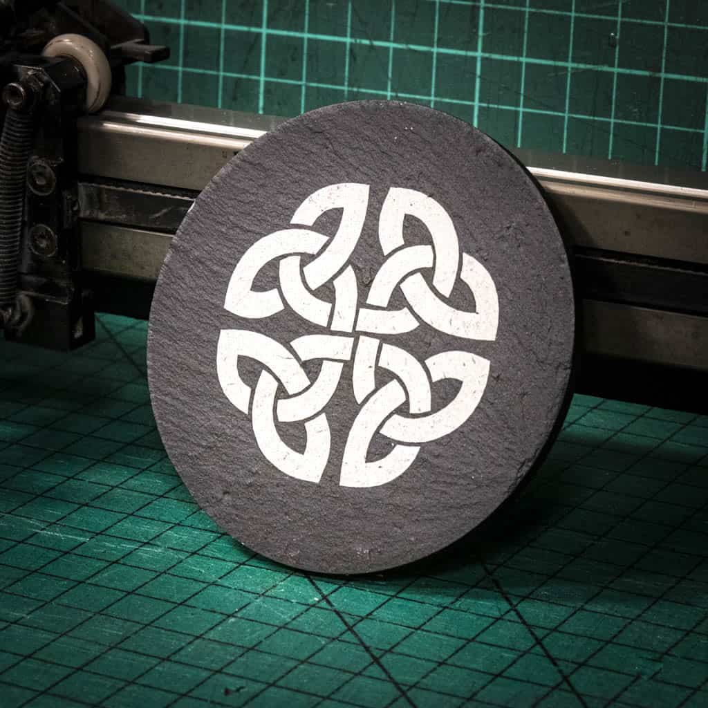 A laser engraved Welsh slate coaster with a Celtic Knot