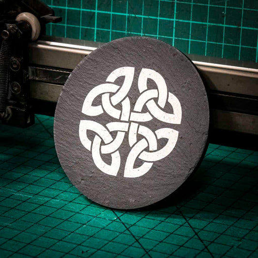 A laser engraved Welsh slate coaster with a Celtic Knot