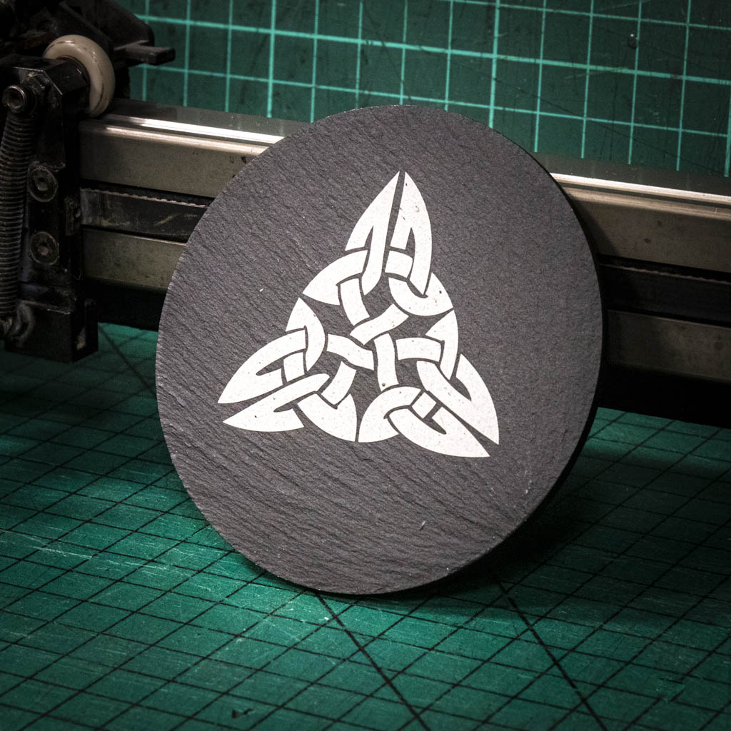 A laser engraved Welsh slate coaster with a Celtic Knot