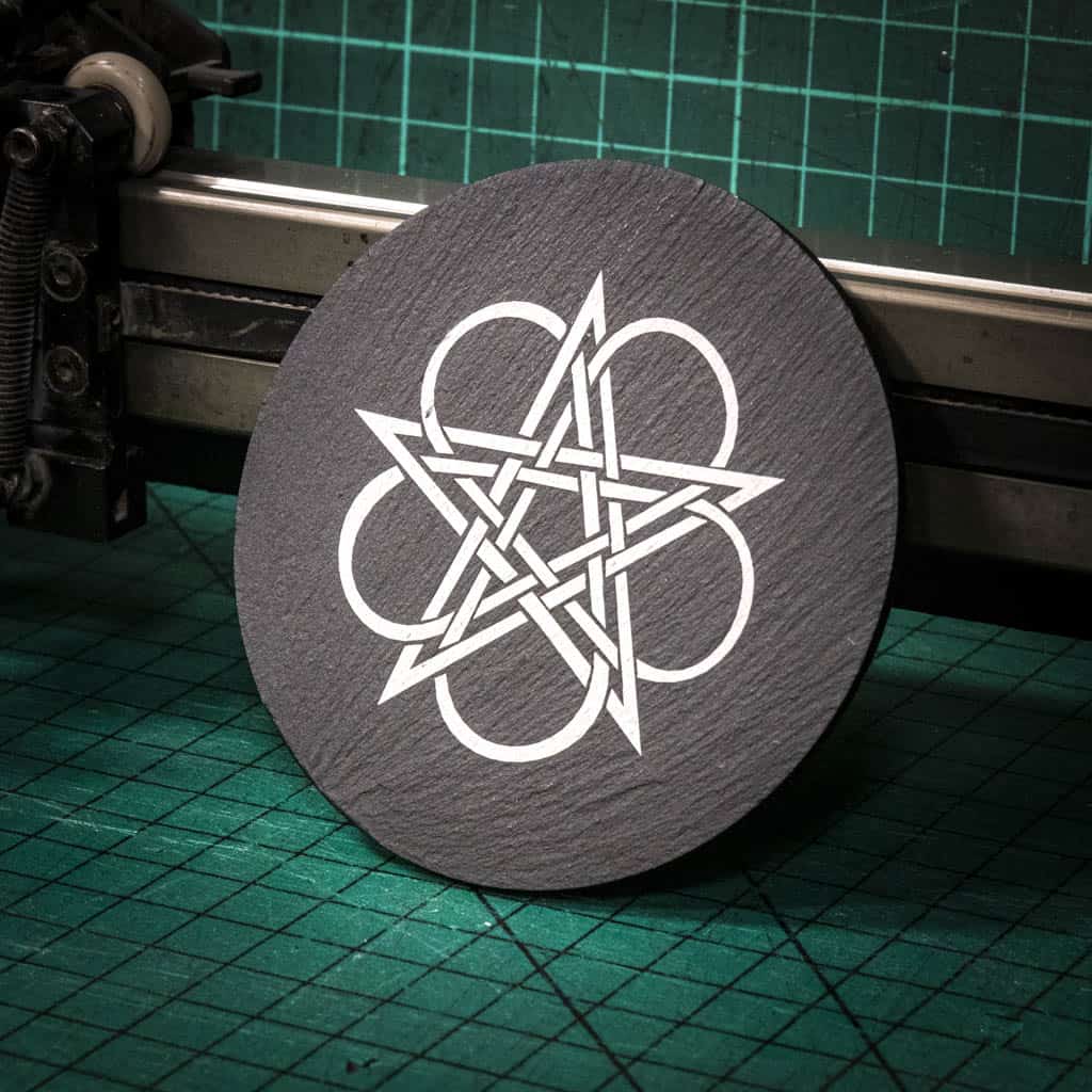 A laser engraved Welsh slate coaster with a Celtic Knot