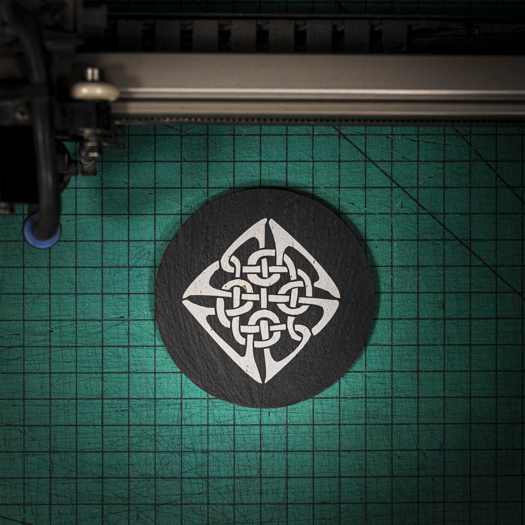 A laser engraved Welsh slate coaster with a Celtic Knot