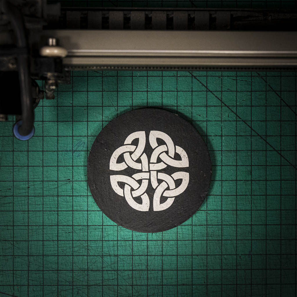 A laser engraved Welsh slate coaster with a Celtic Knot