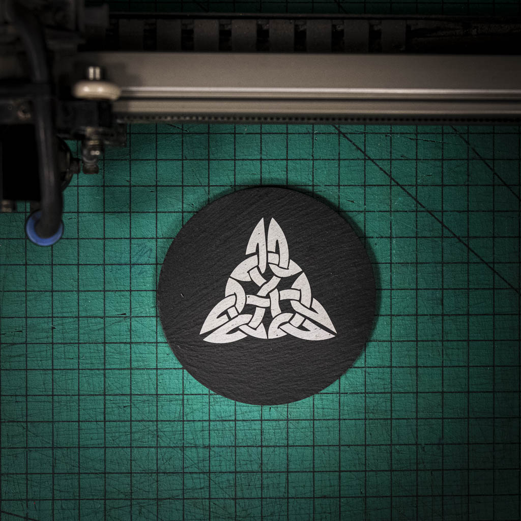 A laser engraved Welsh slate coaster with a Celtic Knot