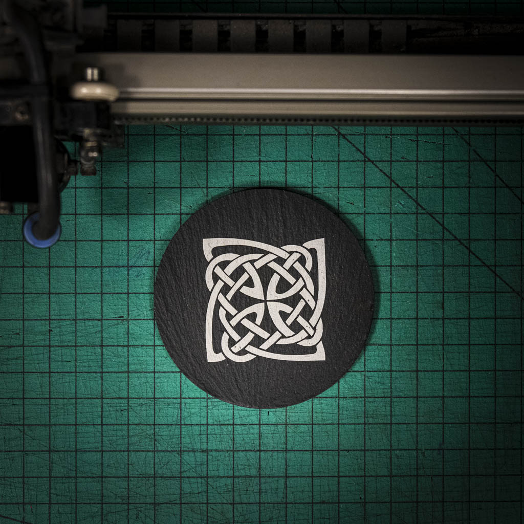 A laser engraved Welsh slate coaster with a Celtic Knot