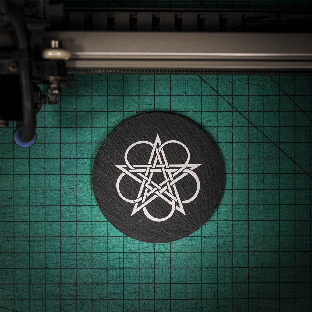 A laser engraved Welsh slate coaster with a Celtic Knot