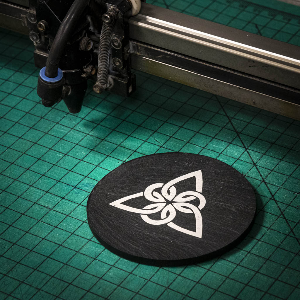 A laser engraved Welsh slate coaster with a Celtic Knot
