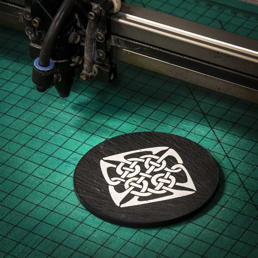 A laser engraved Welsh slate coaster with a Celtic Knot