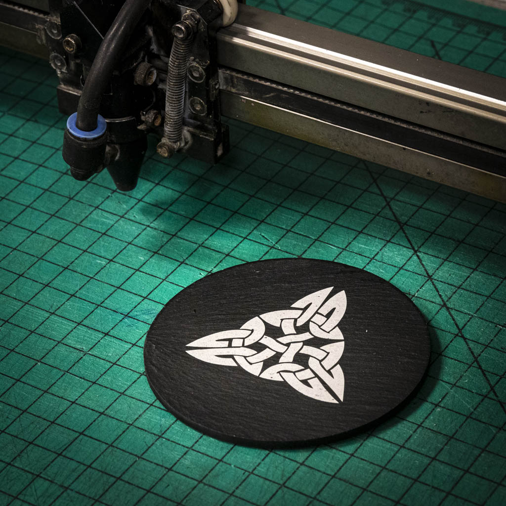 A laser engraved Welsh slate coaster with a Celtic Knot