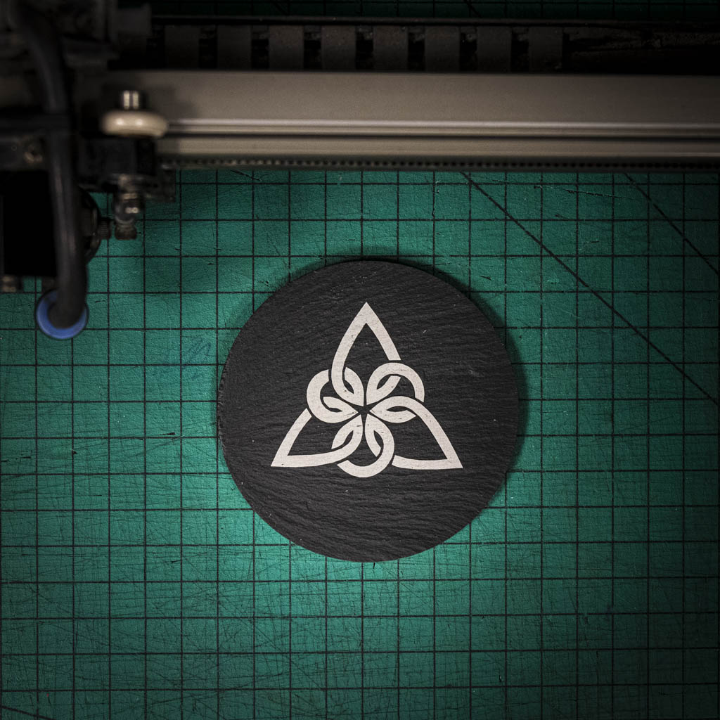 A laser engraved Welsh slate coaster with a Celtic Knot