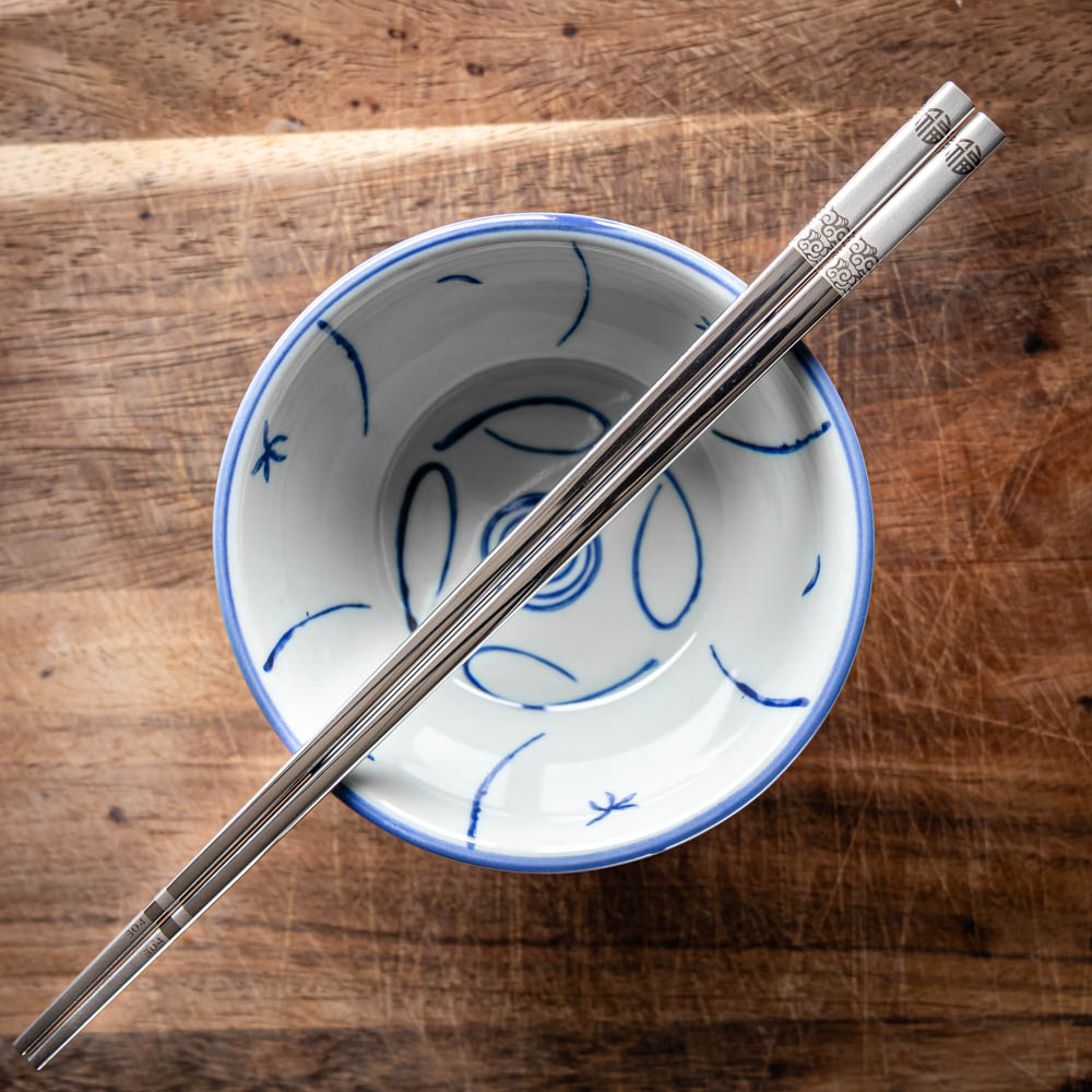 A personalised pair of metal Chinese chopsticks that can be laser engraved with a name