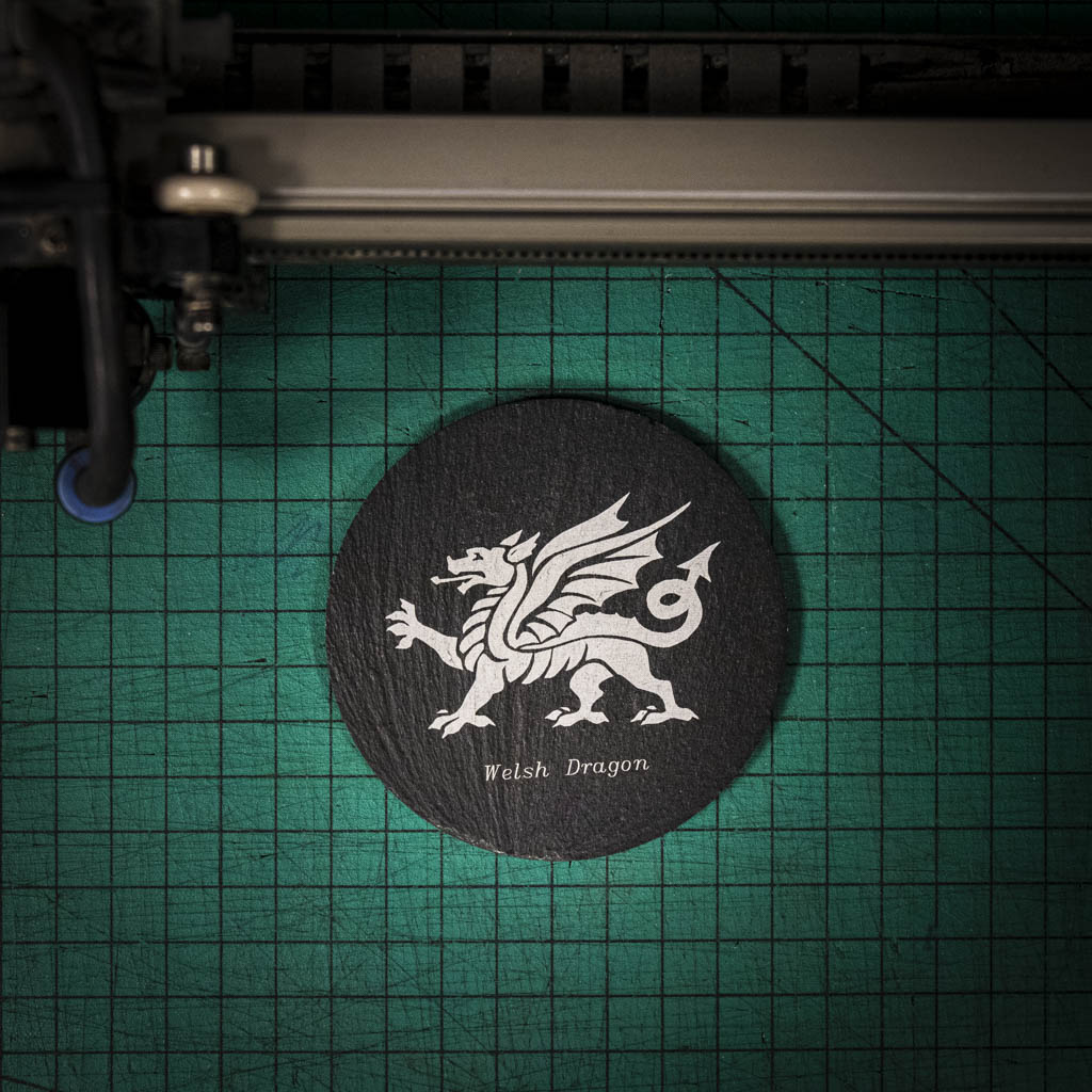 A laser engraved Welsh slate coaster with a welsh dragon