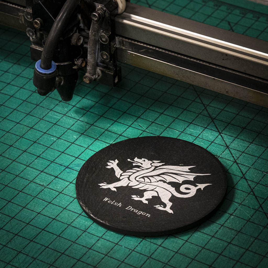 A laser engraved Welsh slate coaster with a welsh dragon