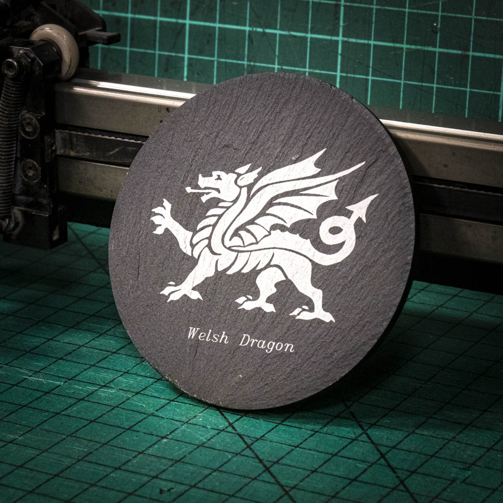 A laser engraved Welsh slate coaster with a welsh dragon