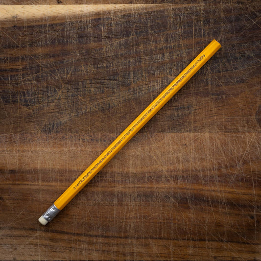 A yellow pencil that is engraved with the irrational number Pi up to 100 decimal places