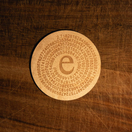 A laser engraved wooden coaster with Euler's number to 250 figures in a circle