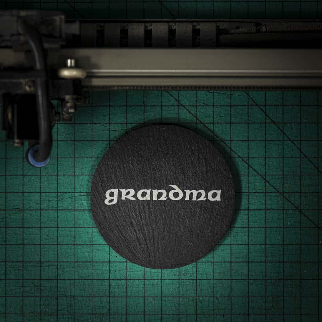 A Welsh slate coaster laser engraved with the word grandma