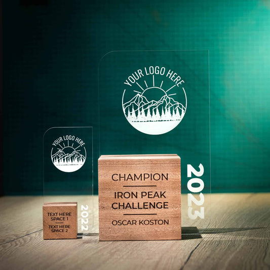 An extra-large leaf, a personalised laser engraved Perspex trophies with an eco friendly wooden base
