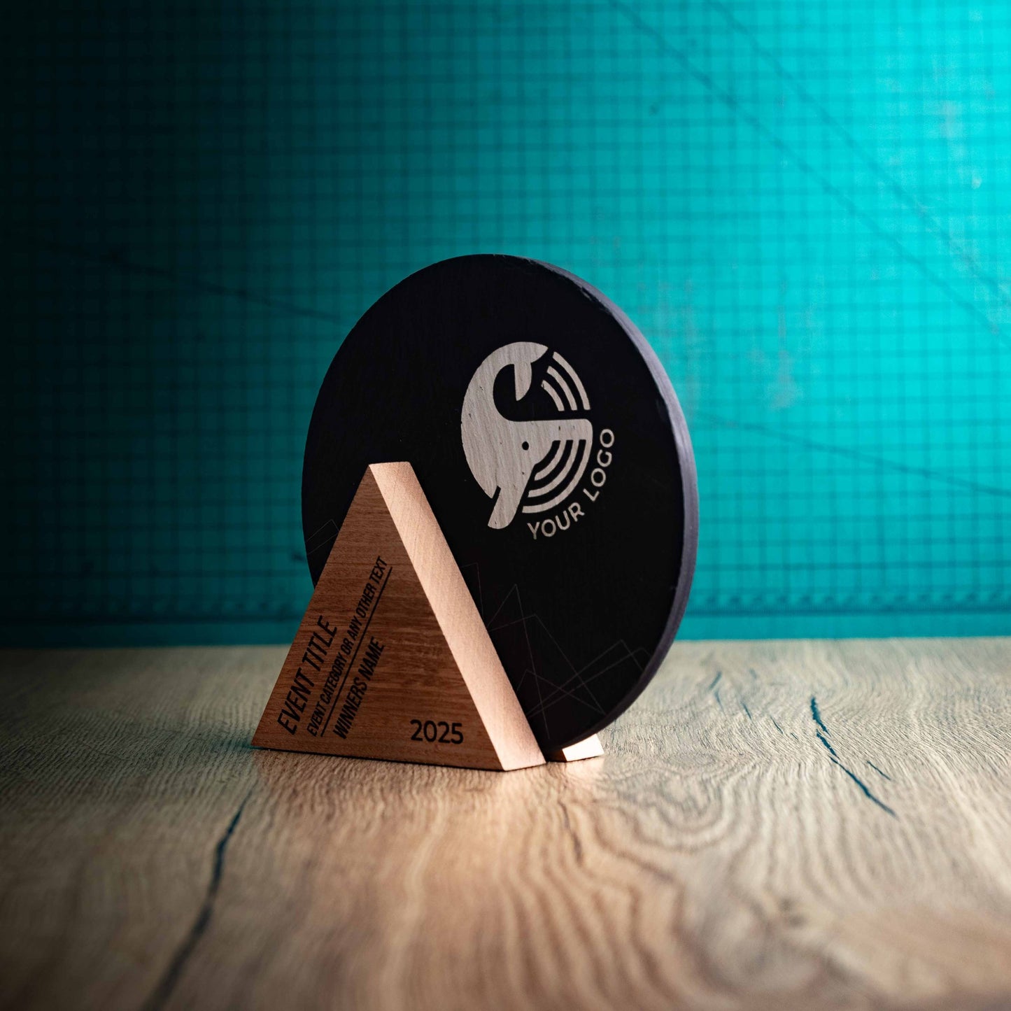 A side angle of a Medium Luna Award, a laser engraved, eco-friendly, wooden and slate trophy