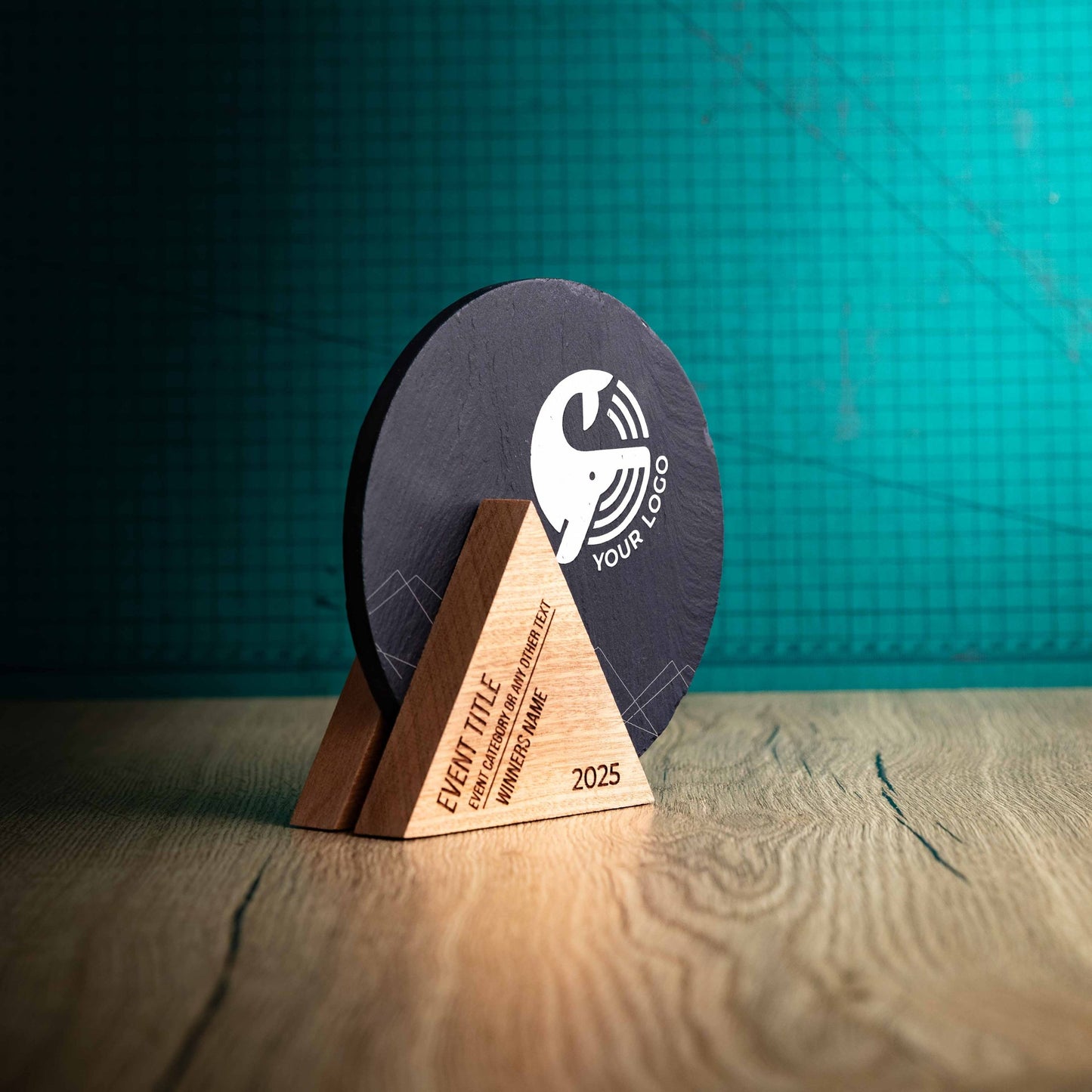 A side angle of a Medium Luna Award, a laser engraved, eco-friendly, wooden and slate trophy