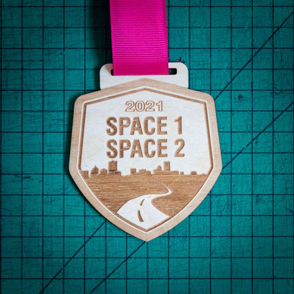 A laser engraved personalised Eco-friendly wooden medal
