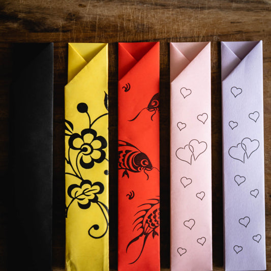 Five Paper chopsticks sleeves printed with various patterns