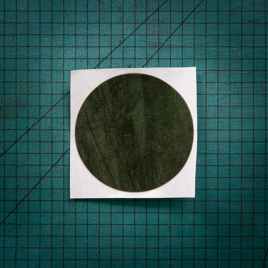 Green felt or baize circles laser cut to various sizes