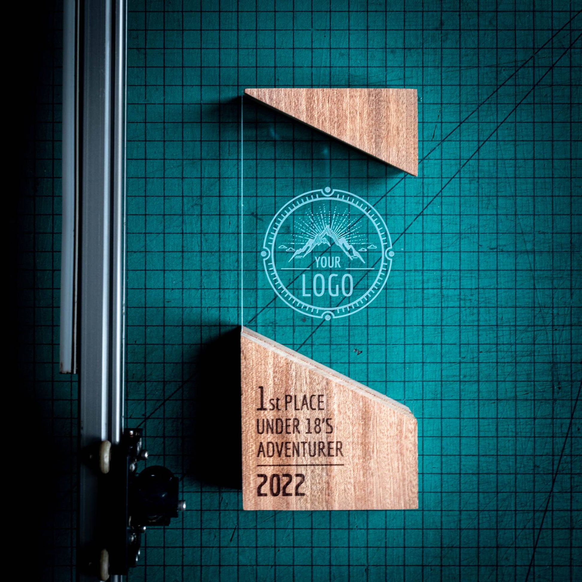 A artistic personalised laser engraved perspex trophies with a wooden base