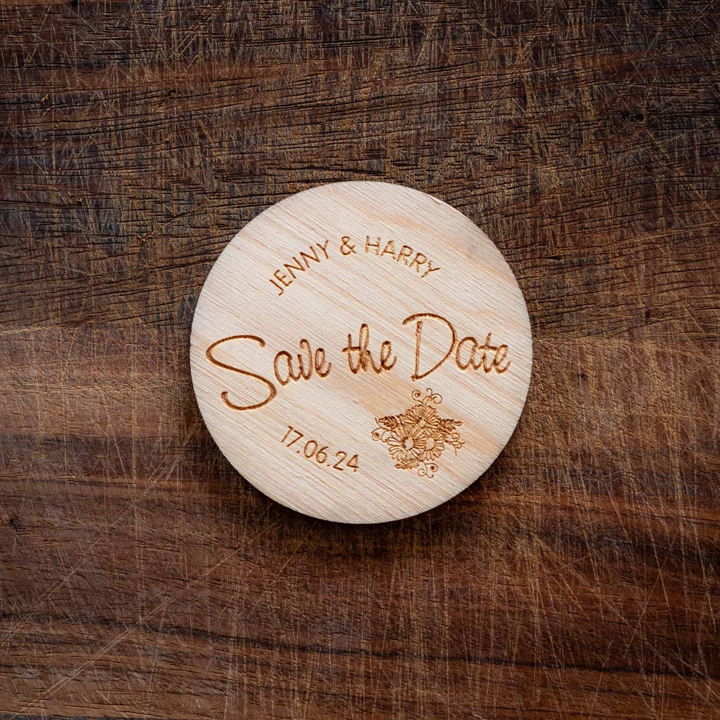 A personlized wooden coaster with a wedding message on it