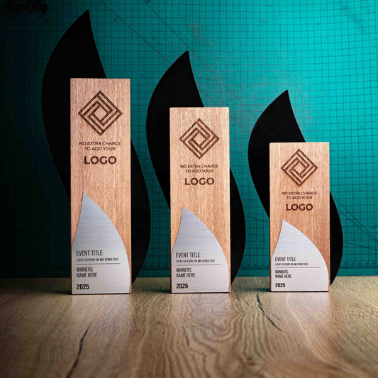 Three unique contemporary laser engraved, eco-friendly, wooden trophies called Flame