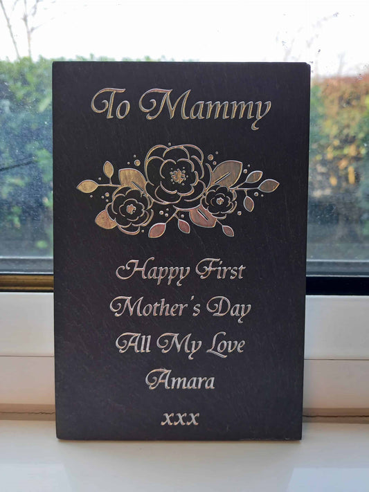 A Mothers day slate plaque with flowers and colour filled