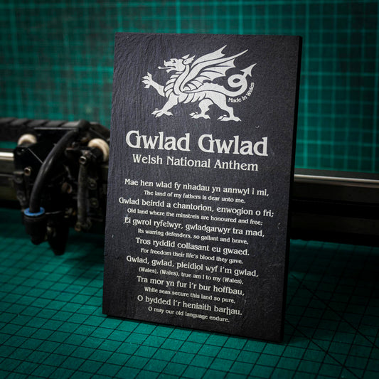 A welsh slate stand up plaque laser engraved with the welsh national anthem in both English and Welsh