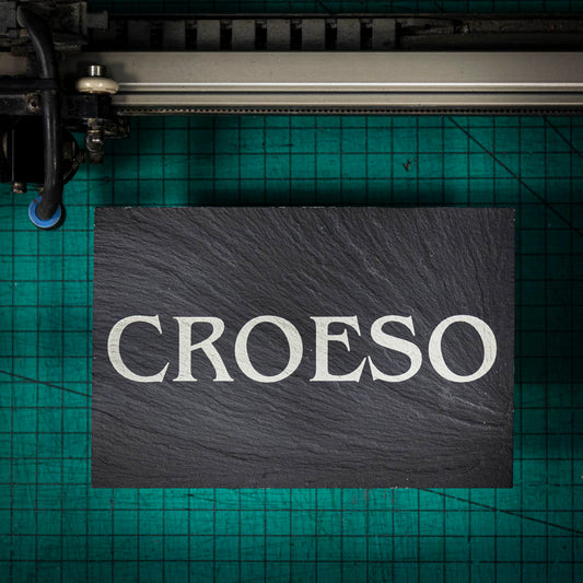 A welsh slate stand up plaque laser engraved with the welsh word for welcome, croeso