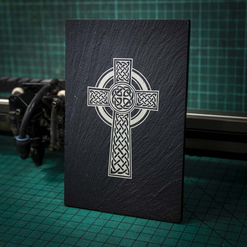 A welsh slate stand up plaque laser engraved with a celtic cross