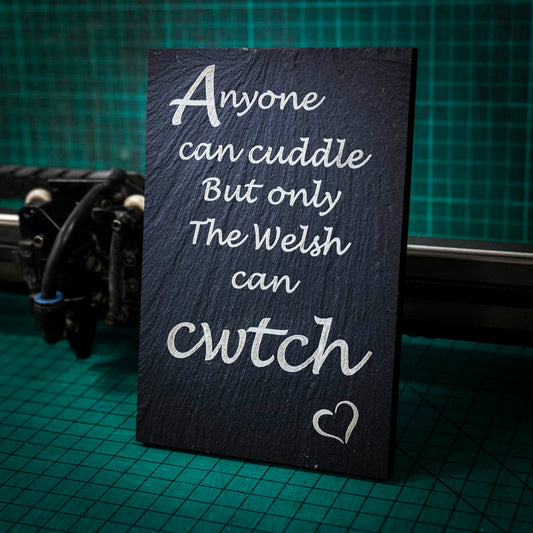 A welsh slate stand up plaque laser engraved with anyone can cuddle but only the welsh can cwtch