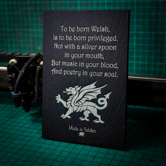 A welsh slate stand up plaque laser engraved with a poem about being welsh and a welsh dragon