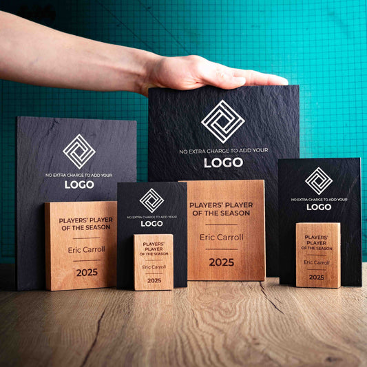 Four laser engraved, eco-friendly, wooden and slate trophies called Sarsen