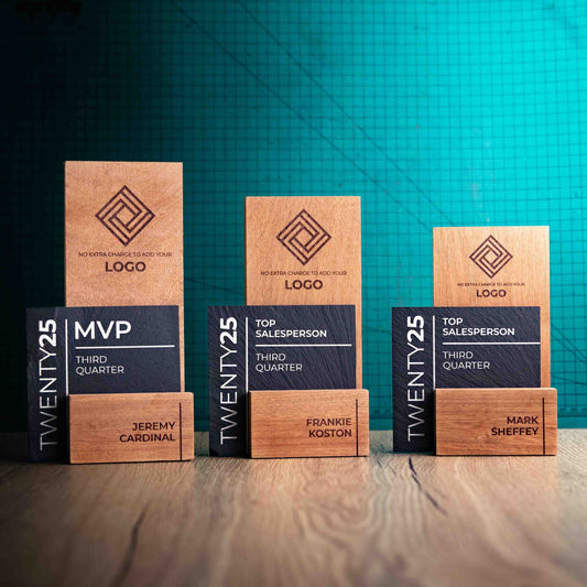 Three laser engraved, eco-friendly, wooden and slate trophies called Skyline