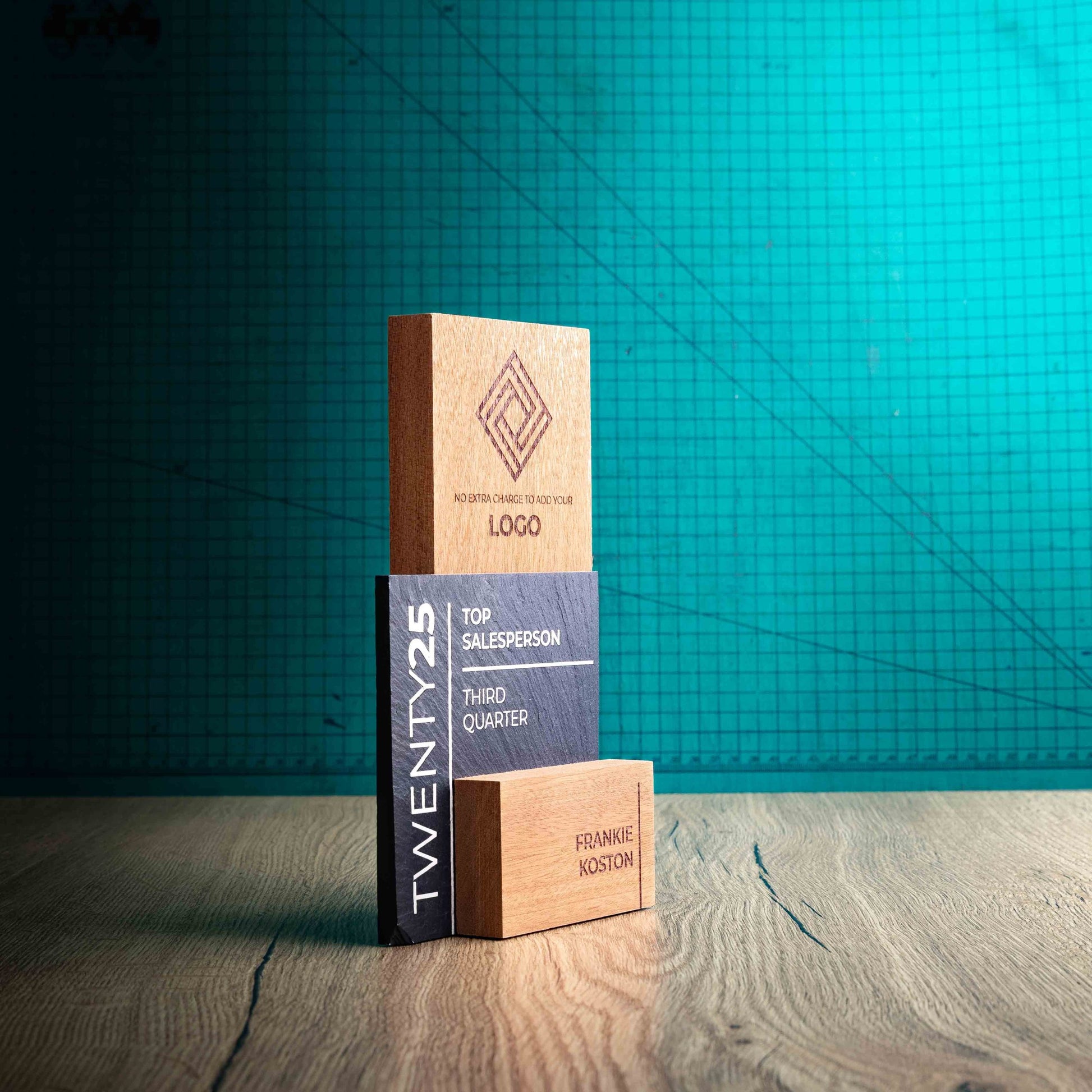 A side angle of a Medium Skyline Award, a laser engraved, eco-friendly, wooden and slate trophy