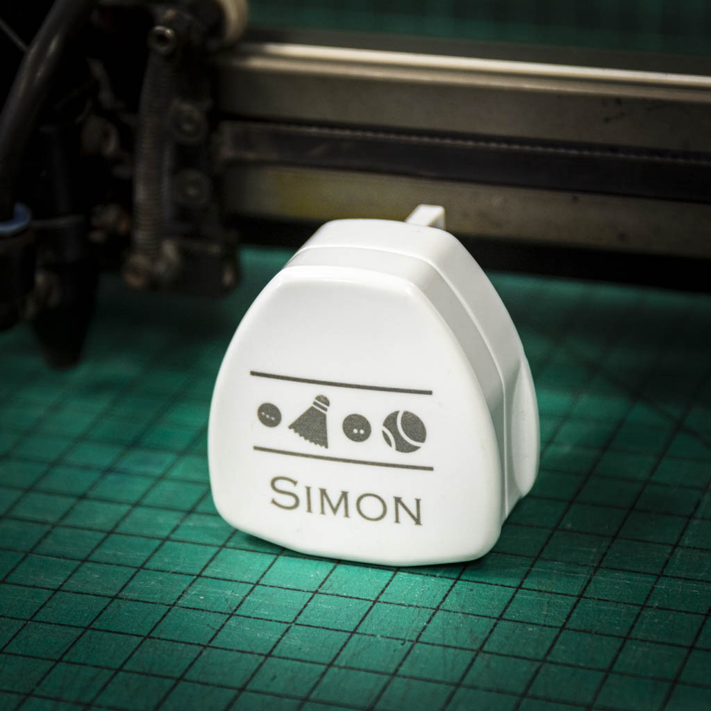 A laser engraved USB plug personalised with a name and image