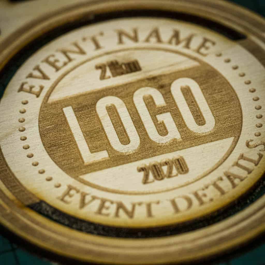 A laser engraved personalised Eco-friendly wooden medal