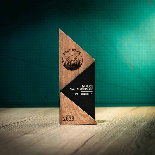 A large laser engraved, eco-friendly, wooden and slate Peak trophy