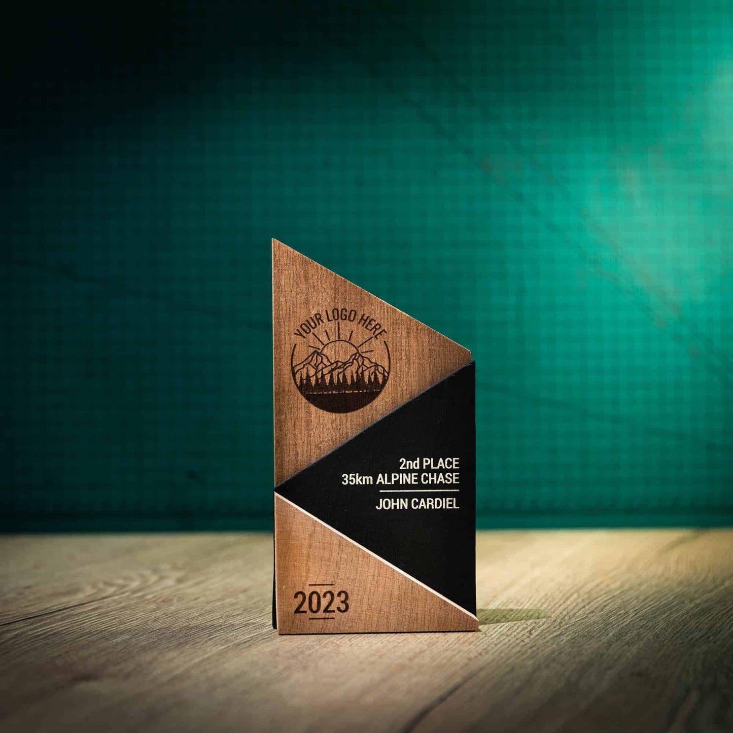A Medium laser engraved, eco-friendly, wooden and slate Peak trophy