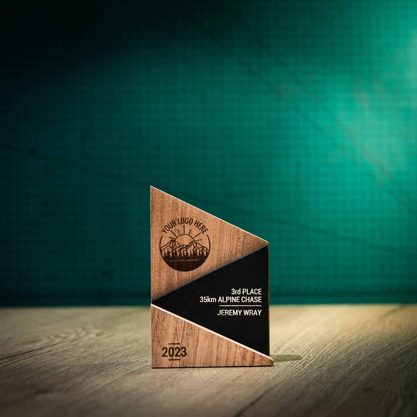 A Small laser engraved, eco-friendly, wooden and slate Peak trophy