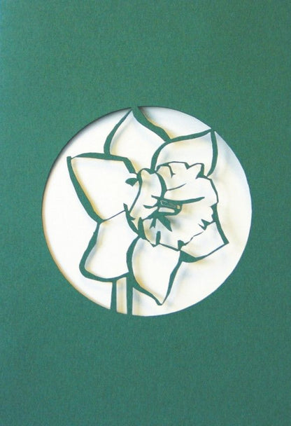 A Welsh greetings card laser cut card with a Welsh emblem representing a daffodil