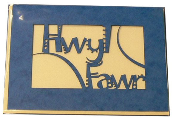 A laser cut card with the welsh word Hwyl Fawr