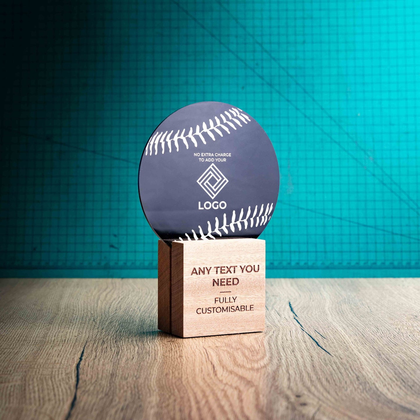 A side view of a medium Baseball trophy with custom text and logos, on an eco-friendly wooden base, with a black Perspex Baseball mounted on top, featuring fully customisable areas for text and logos.